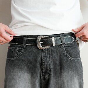 y2k silver buckle black tooled leather belt — western swirl wave style